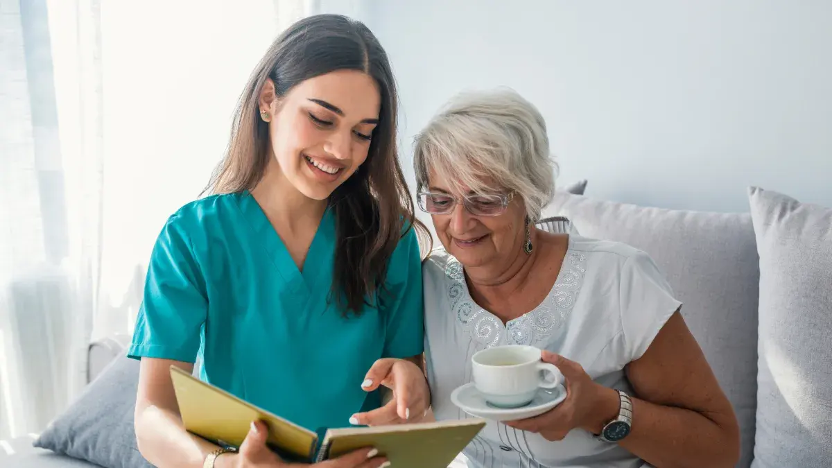 Caregiver sharing time with a senior client